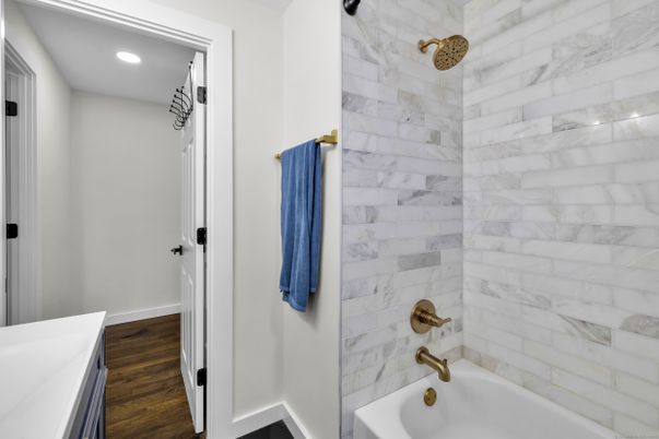Bathroom, Interior, Marble Walls, Recessed Lighting, Wood Texture Flooring