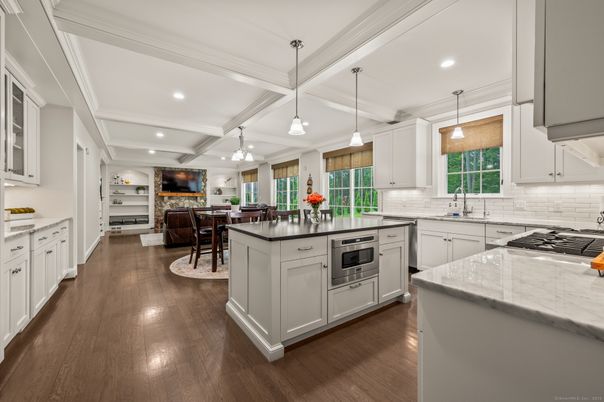 Dining room, Interior, Kitchen, Pendant Lights, Recessed Lighting, Stainless Steel Appliances, Wood Texture Flooring