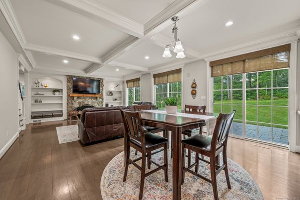 Dining room, Fireplace, Interior, Living room, Pendant Lights, Recessed Lighting, Wood Texture Flooring