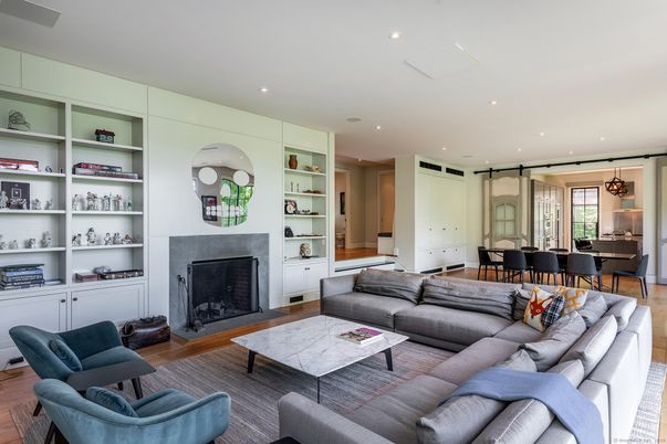 Dining room, Fireplace, Interior, Living room, Recessed Lighting, Wood Texture Flooring