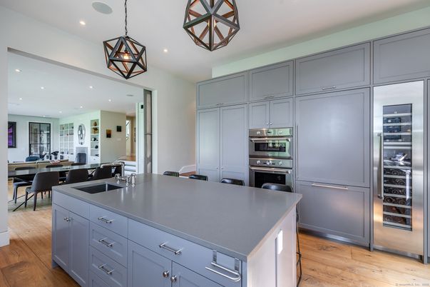 Dining room, Interior, Kitchen, Pendant Lights, Recessed Lighting, Stainless Steel Appliances, Wood Texture Flooring