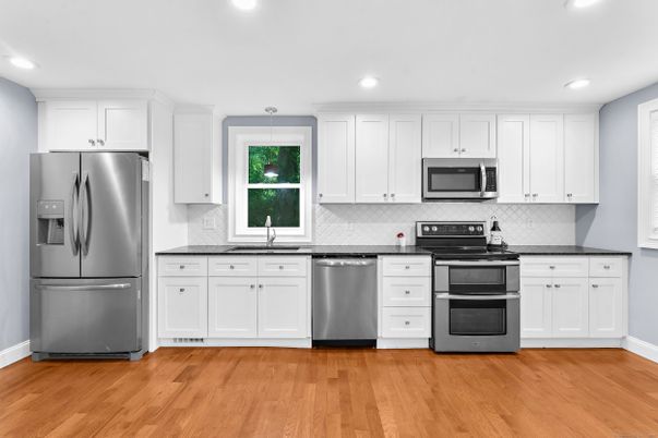Interior, Kitchen, Recessed Lighting, Stainless Steel Appliances, Wood Texture Flooring