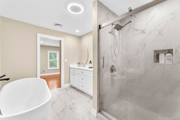 Bathroom, Dual Sink Vanities, Free Standing Baths, Glass Shower, Interior, Marble, Marble Walls, Recessed Lighting