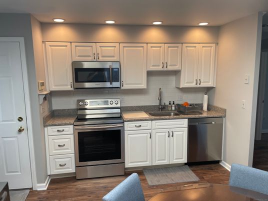 Interior, Kitchen, Recessed Lighting, Stainless Steel Appliances, Wood Texture Flooring