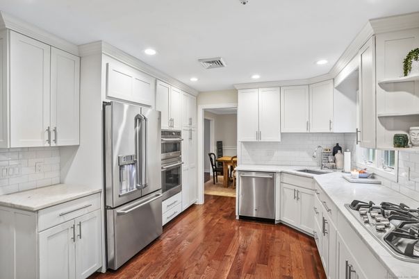 Interior, Kitchen, Recessed Lighting, Stainless Steel Appliances, Wood Texture Flooring