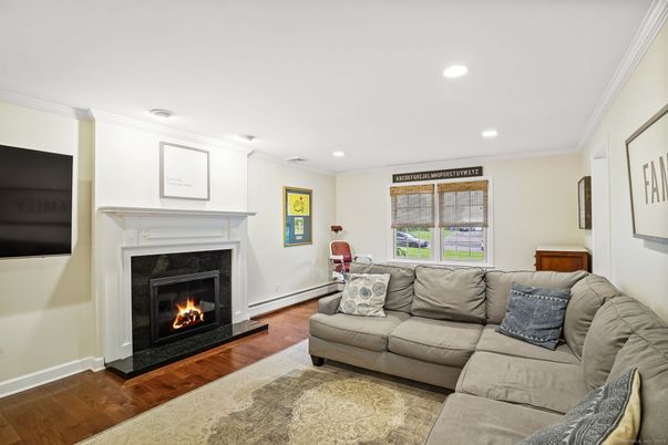 Fireplace, Interior, Living room, Recessed Lighting, Wood Texture Flooring