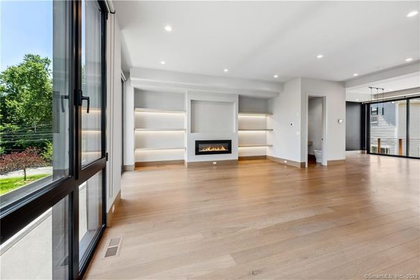 Empty room, Fireplace, Interior, Pendant Lights, Recessed Lighting, Wood Texture Flooring