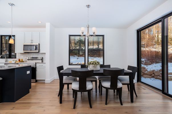 Dining room, Interior, Kitchen, Pendant Lights, Recessed Lighting, Stainless Steel Appliances, Wood Texture Flooring
