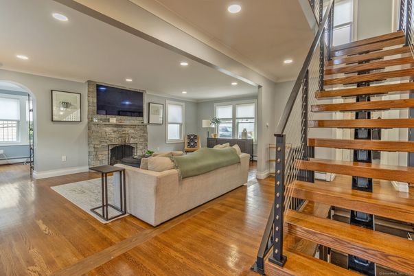 Fireplace, Interior, Living room, Recessed Lighting, Wood Texture Flooring