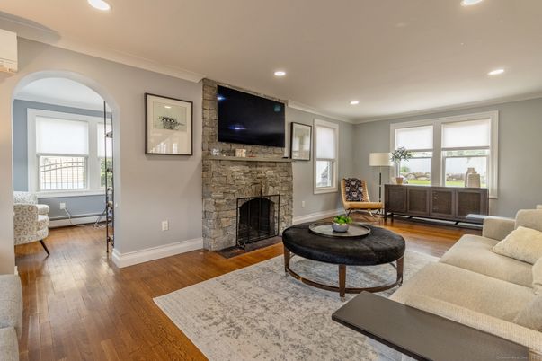 Fireplace, Interior, Living room, Recessed Lighting, Wood Texture Flooring