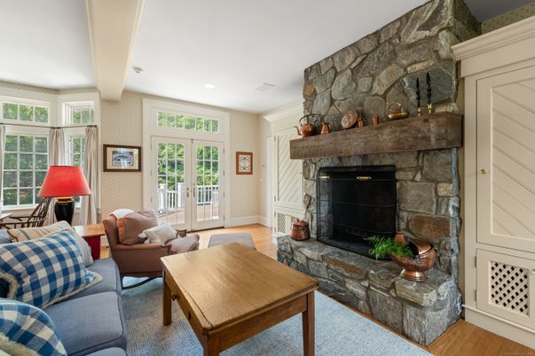 Fireplace, Interior, Living room, Recessed Lighting, Stone Walls, Wood Texture Flooring