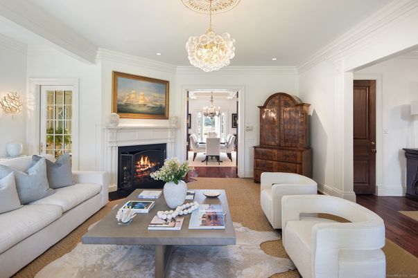 Chandelier, Dining room, Fireplace, Interior, Living room, Recessed Lighting, Wood Texture Flooring
