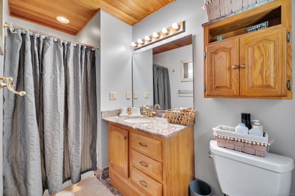 Bathroom, Dual Sink Vanities, Interior, Recessed Lighting, Wooden Ceilings