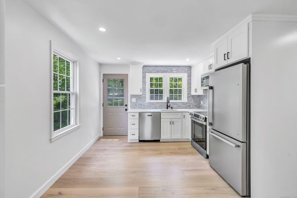Interior, Kitchen, Recessed Lighting, Stainless Steel Appliances, Wood Texture Flooring