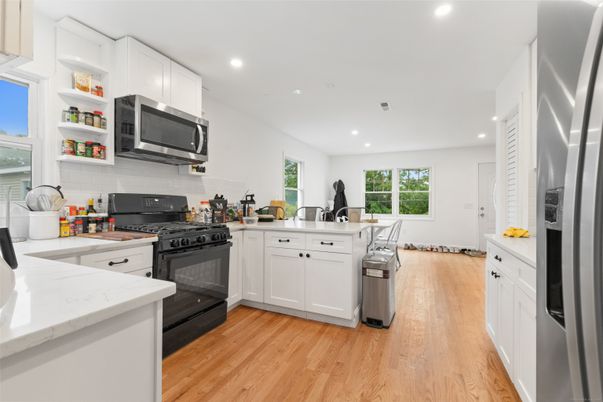 Interior, Kitchen, Recessed Lighting, Stainless Steel Appliances, Wood Texture Flooring