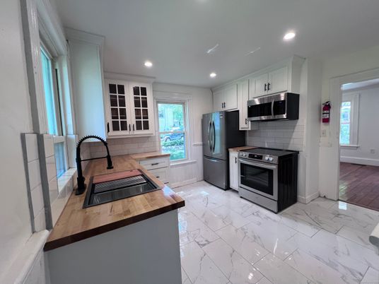 Interior, Kitchen, Marble, Recessed Lighting, Stainless Steel Appliances, Wood Texture Flooring
