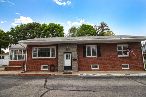 Exterior, Facade, Brick Facade, Raised Ranch
