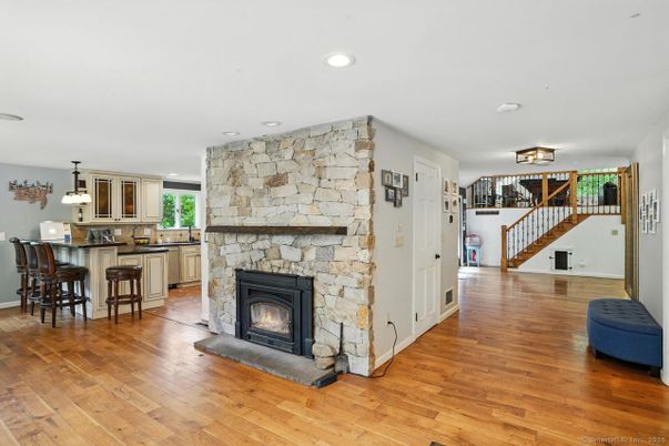 Fireplace, Interior, Kitchen, Pendant Lights, Recessed Lighting, Stone Walls, Wood Texture Flooring