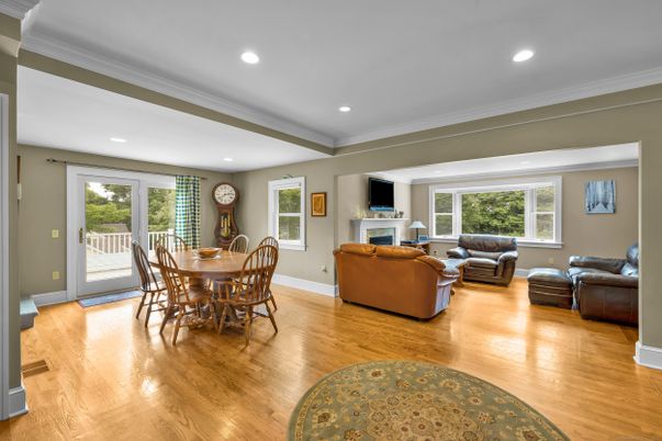 Dining room, Fireplace, Interior, Living room, Recessed Lighting, Wood Texture Flooring