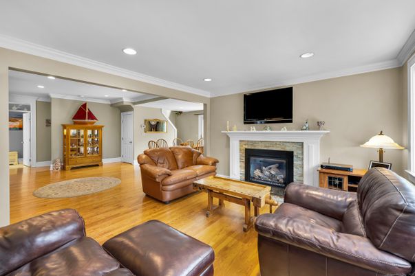 Fireplace, Interior, Living room, Recessed Lighting, Wood Texture Flooring