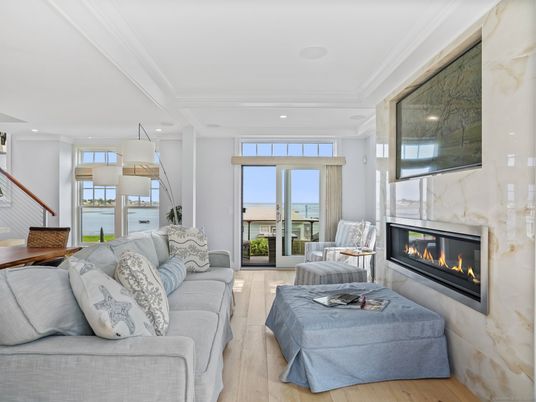 Fireplace, Interior, Living room, Pendant Lights, Recessed Lighting, Water, Wood Texture Flooring
