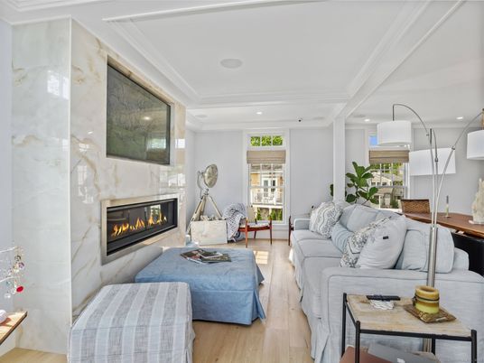 Fireplace, Interior, Living room, Marble Walls, Recessed Lighting, Wood Texture Flooring