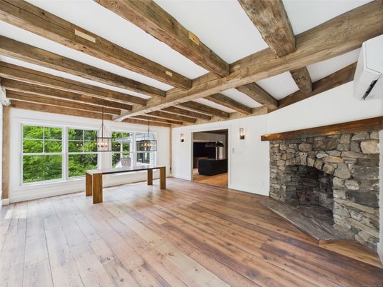 Empty room, Fireplace, Interior, Pendant Lights, Stone Walls, Wooden Beams, Wood Texture Flooring