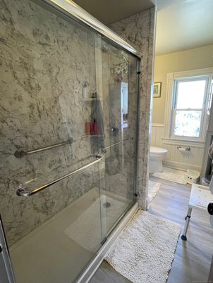 Bathroom, Glass Shower, Interior, Marble Walls, Wood Texture Flooring