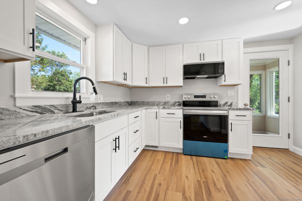 Interior, Kitchen, Recessed Lighting, Stainless Steel Appliances, Wood Texture Flooring
