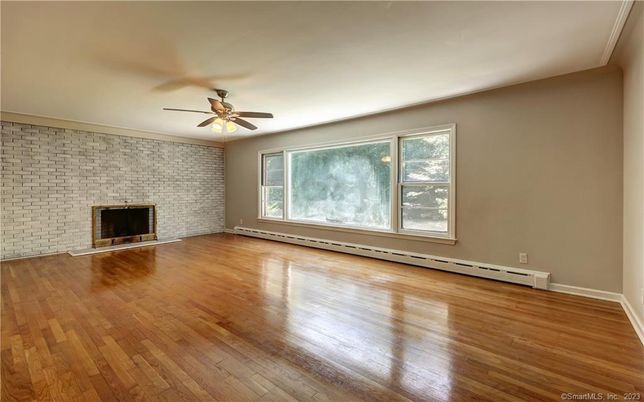 Empty room, Fireplace, Interior, Stone Walls, Wood Texture Flooring