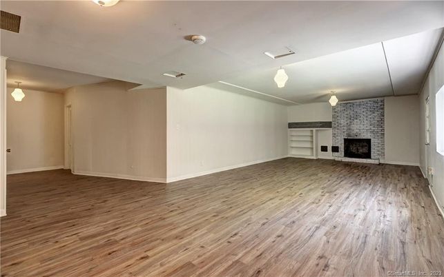 Empty room, Fireplace, Interior, Pendant Lights, Wood Texture Flooring