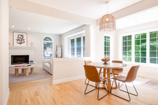 Dining room, Fireplace, Interior, Living room, Pendant Lights, Recessed Lighting, Wood Texture Flooring