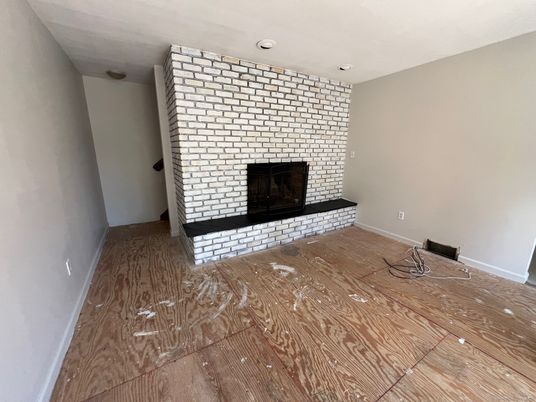 Empty room, Fireplace, Interior, Stone Walls, Wood Texture Flooring