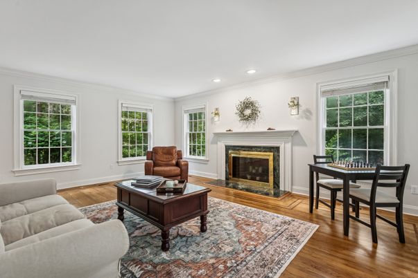 Dining room, Fireplace, Interior, Living room, Recessed Lighting, Wood Texture Flooring