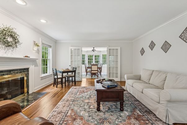 Dining room, Fireplace, Interior, Living room, Recessed Lighting, Wood Texture Flooring