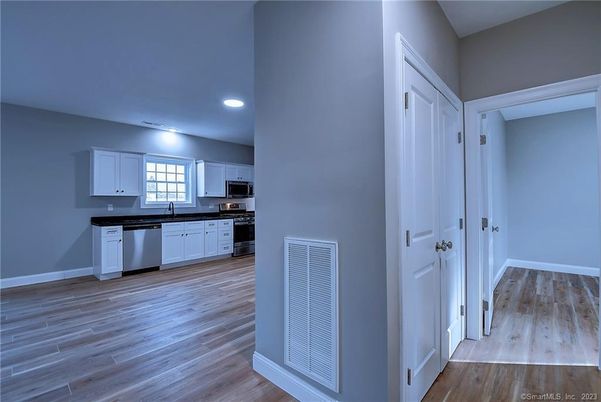 Interior, Kitchen, Recessed Lighting, Stainless Steel Appliances, Wood Texture Flooring