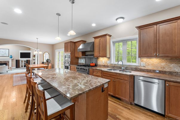 Dining room, Interior, Kitchen, Pendant Lights, Recessed Lighting, Stainless Steel Appliances, Wood Texture Flooring