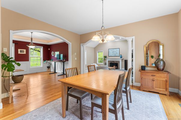 Dining room, Fireplace, Interior, Pendant Lights, Wood Texture Flooring