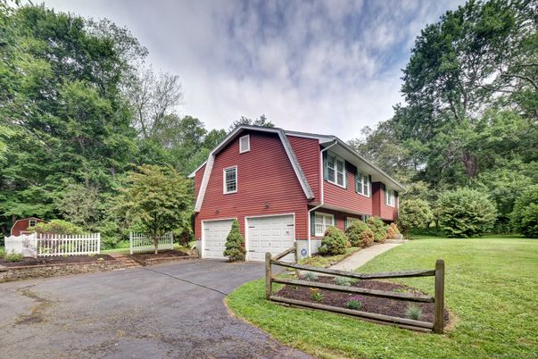 Attached, Backyard, Exterior, Facade, Brick Facade, Split Level