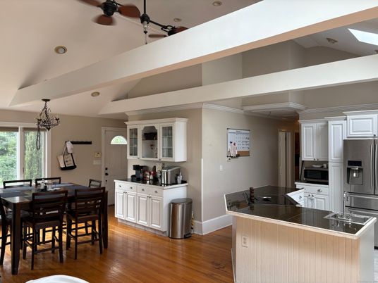 Chandelier, Dining room, Interior, Kitchen, Recessed Lighting, Stainless Steel Appliances, Wood Texture Flooring
