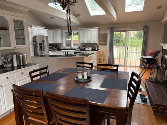 Dining room, Interior, Kitchen, Pendant Lights, Stainless Steel Appliances, Wood Texture Flooring