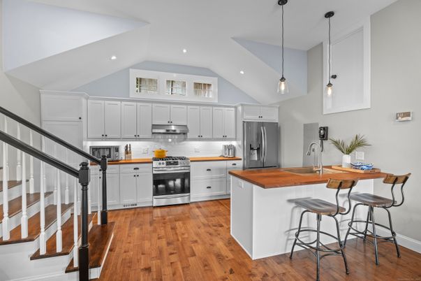 Interior, Kitchen, Pendant Lights, Recessed Lighting, Stainless Steel Appliances, Wood Texture Flooring