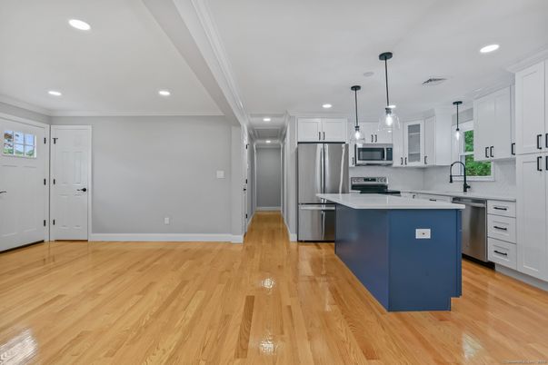 Interior, Kitchen, Pendant Lights, Recessed Lighting, Stainless Steel Appliances, Wood Texture Flooring