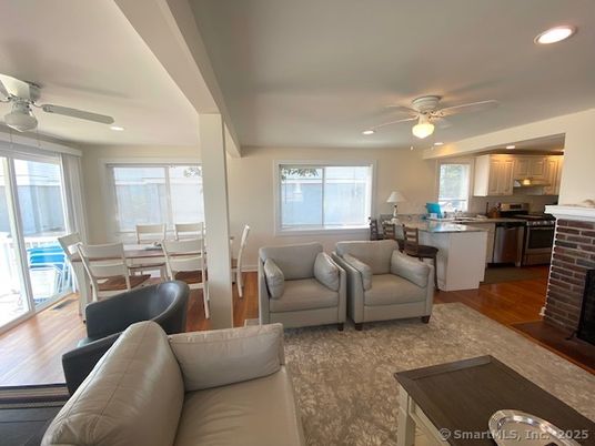 Dining room, Interior, Kitchen, Living room, Recessed Lighting, Stainless Steel Appliances, Wood Texture Flooring