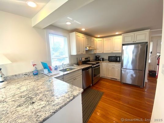 Interior, Kitchen, Recessed Lighting, Stainless Steel Appliances, Wood Texture Flooring
