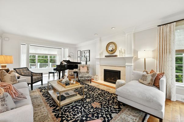Fireplace, Interior, Living room, Piano, Recessed Lighting, Wood Texture Flooring