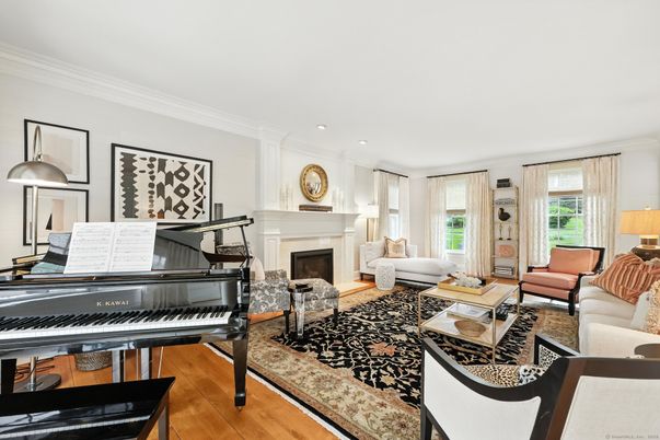 Fireplace, Interior, Living room, Piano, Recessed Lighting, Wood Texture Flooring