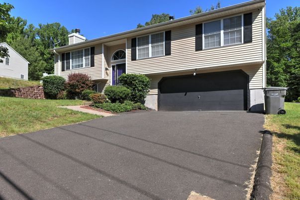 Attached, Exterior, Facade, Raised Ranch