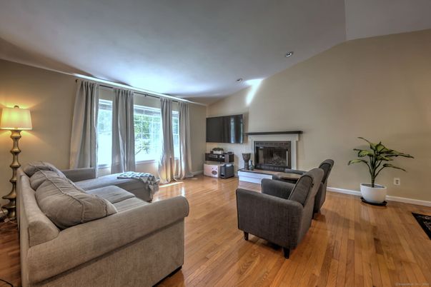 Fireplace, Interior, Living room, Recessed Lighting, Wood Texture Flooring