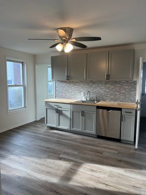 Interior, Kitchen, Stainless Steel Appliances, Stone Walls, Wood Texture Flooring